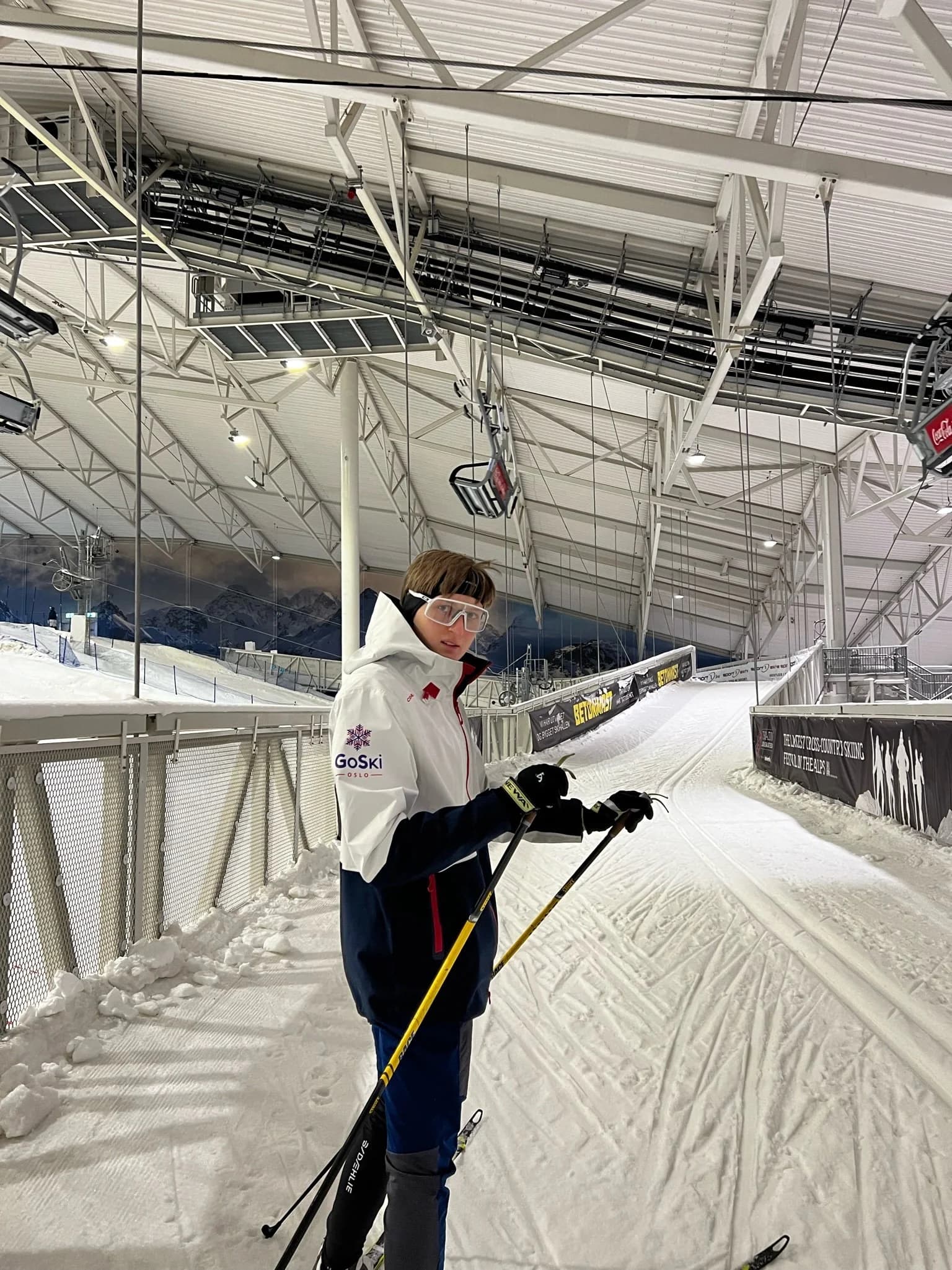 Dmitry in GoSki jacket at an indoor ski slope